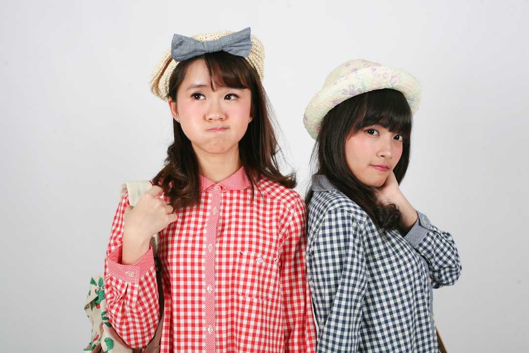 two young women standing next to each other